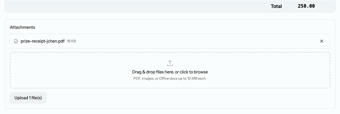The Attachments panel on a cheque form with one attached file, the drag-and-drop dropzone noting PDF, images, or Office docs up to 10 MB each, and an Upload 1 file(s) button