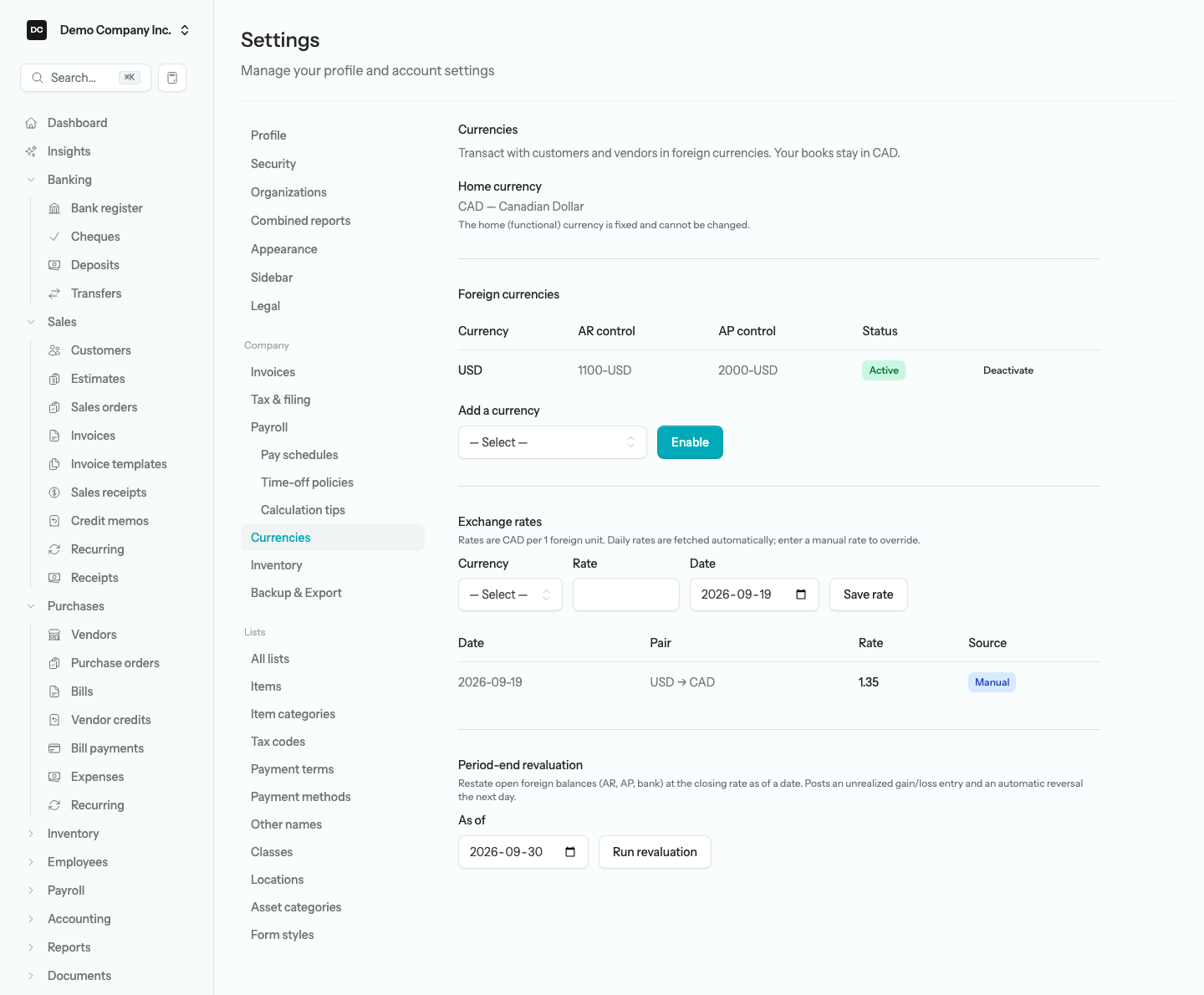The Settings → Currencies page showing CAD as the home currency, USD listed under Foreign currencies with its AR control and AP control account codes and an Active badge, the Add a currency selector, and the Exchange rates and Period-end revaluation sections below